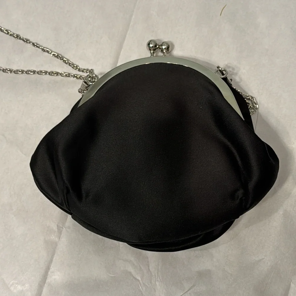 Black satin rosette purse with removable silver chain
